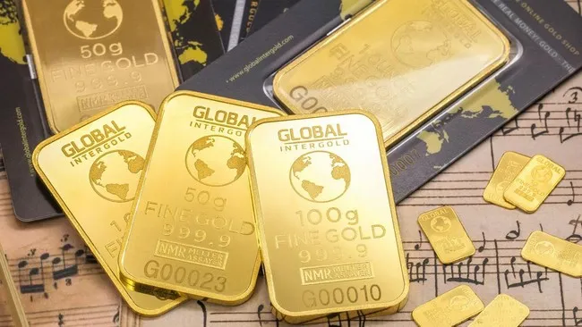 Harga Emas Stabil di Atas $5.000 Usai Pekan Bergejolak