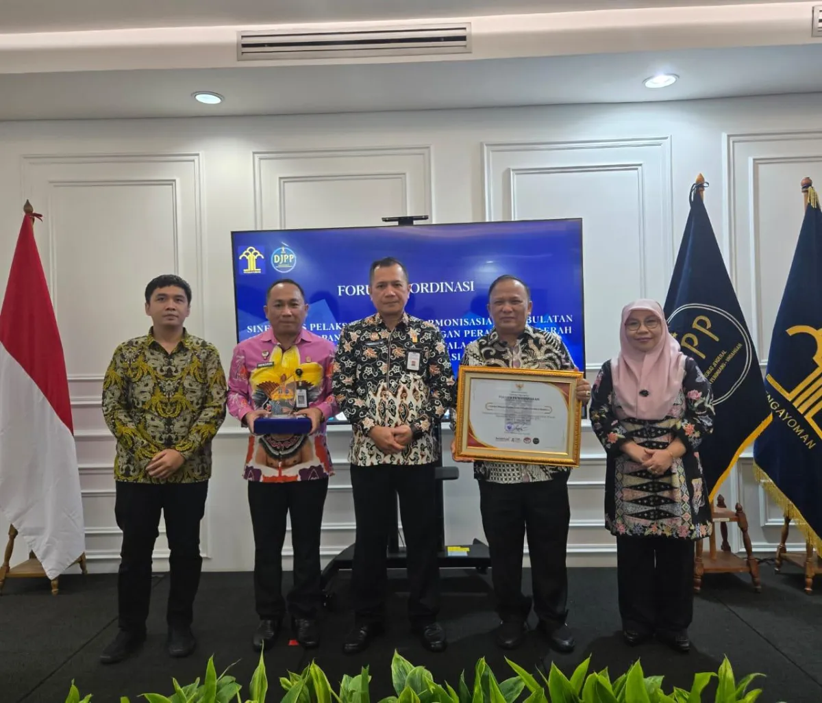 Kanwil Kemenkum Sumsel Raih Penghargaan Legislasi Daerah Terbaik Nasional 2025