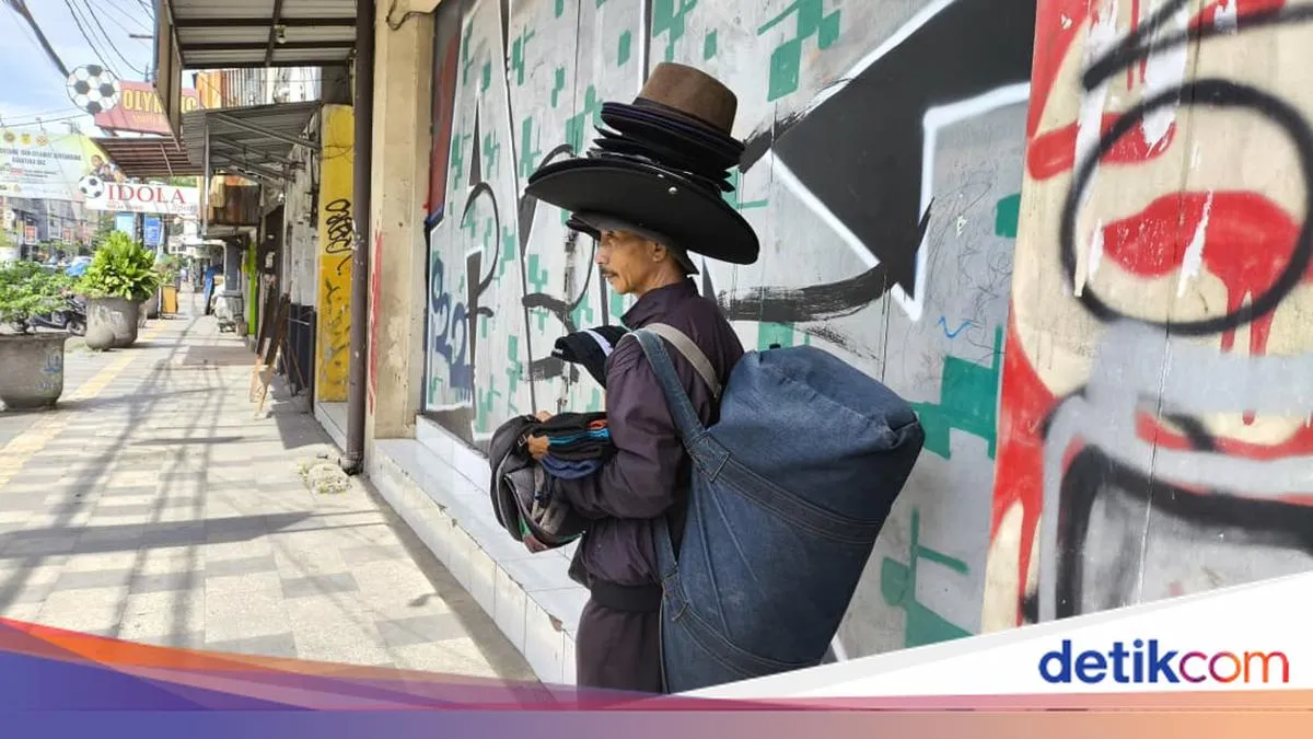 Maha Mulyana: Penjual Topi yang Berjuang untuk Pendidikan Anak