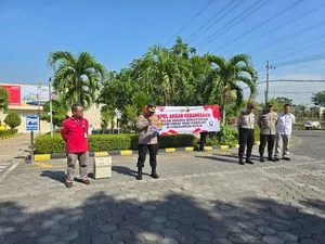 Polres Pasuruan Gelar Apel Kebangsaan Buruh untuk Jaga Kamtibmas