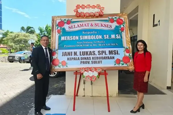 Merson Simbolon Raih Gelar Doktor Dalam Ilmu Manajemen di Universitas Sam Ratulangi
