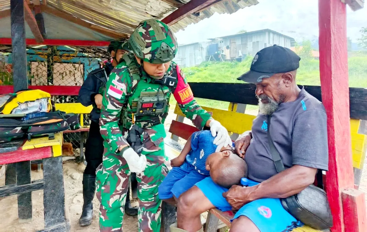 Satgas Pamtas Yonif 136/TS Laksanakan Layanan Medis Gratis di Puncak Jaya