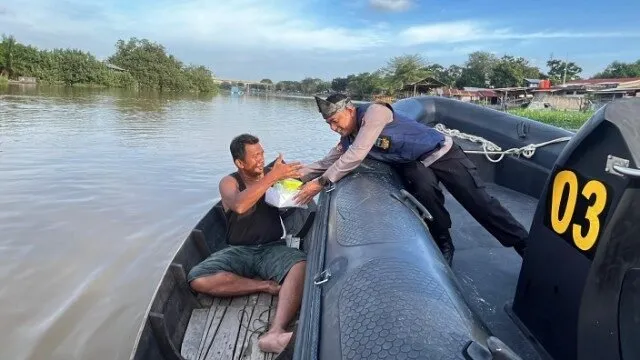 Program JALUR Polda Riau: Layanan Sosial dan Kesehatan untuk Nelayan Sungai Siak