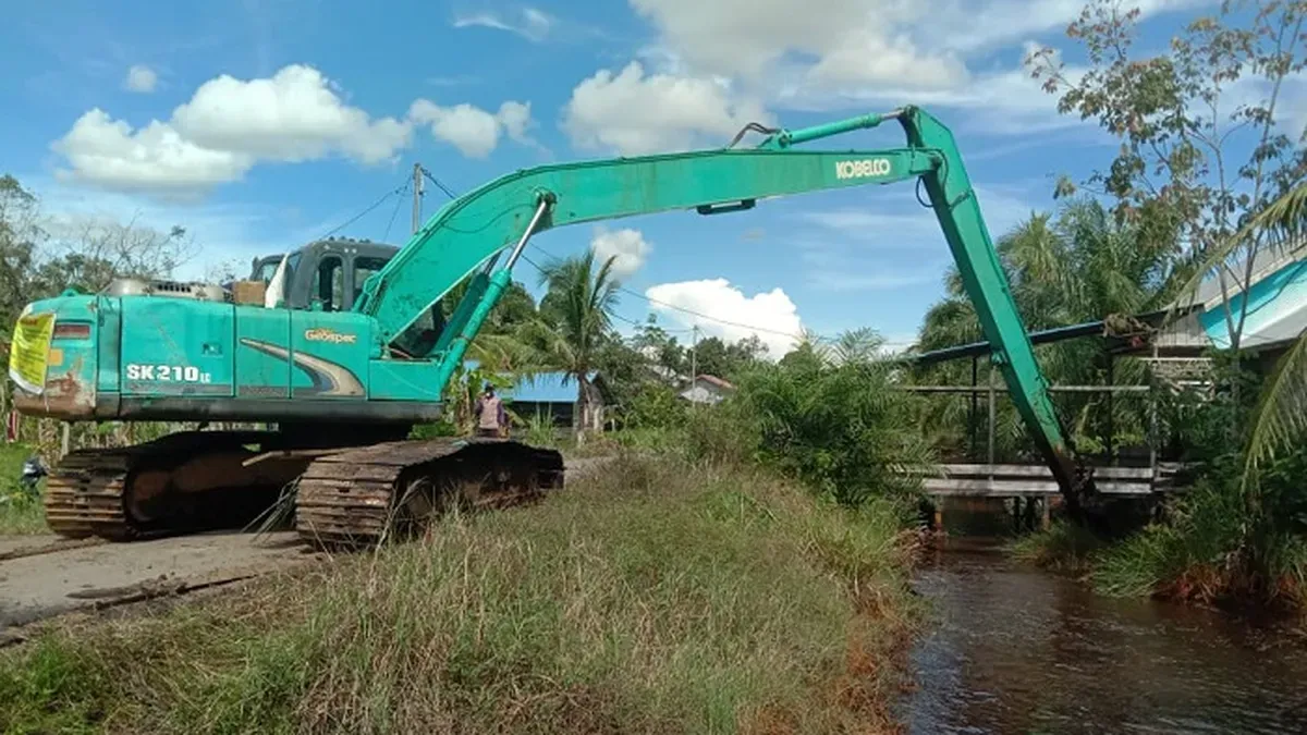 CMI Dukung Revitalisasi Saluran Pembuangan di Desa Rantau Panjang