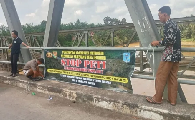 Pemerintah Desa Jelatang Pasang Baliho Larangan Aktivitas PETI Pasca Viral