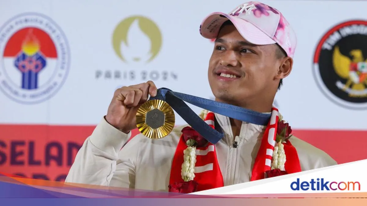 Rizki Juniansyah Raih Dua Rekor Dunia di Angkat Besi
