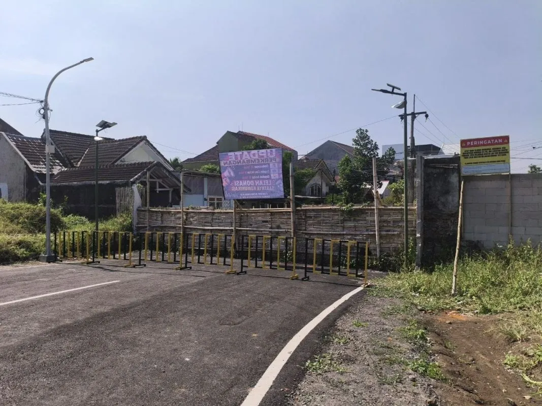 Pengendara Keluhkan Kebijakan Buka-Tutup Portal Utama di Perumahan Griyashanta